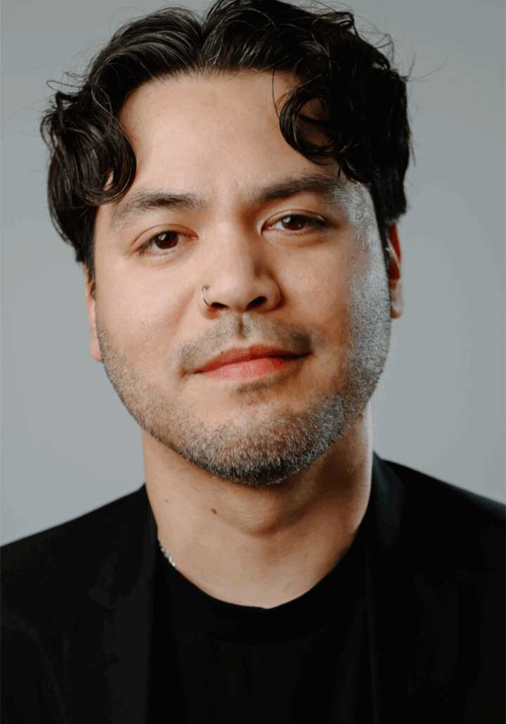 Photo of Octavio Gonzalez on a solid gray background